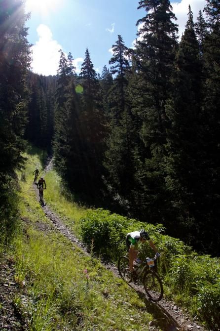 Ben Sonntag with Alex Grant and Todd Wells in hot pursuit down the first climb of the stage