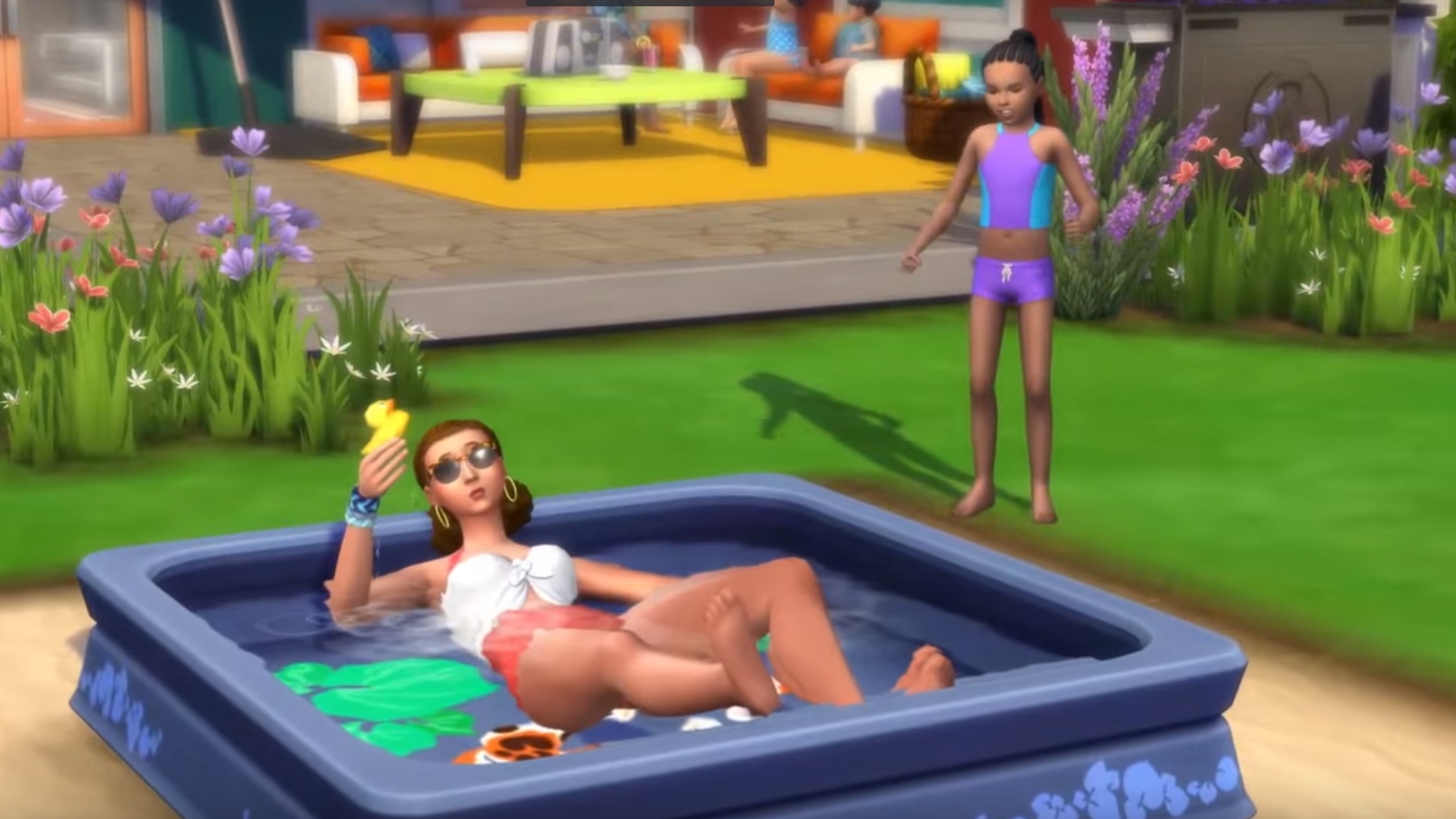 The Sims 4 seasons - A sim relaxes in a blowup pool
