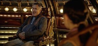 Frank Walker (George Clooney) inside a lavish 1920's-style rocket capsule in the new Disney movie, "Tomorrowland."