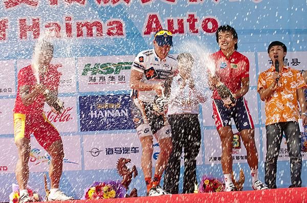 Stage four spray (l-r): Wong Kam Po (Hong Kong China Team), Deon Locke (Champion Systems) and Ma Hainjun (China National Team).