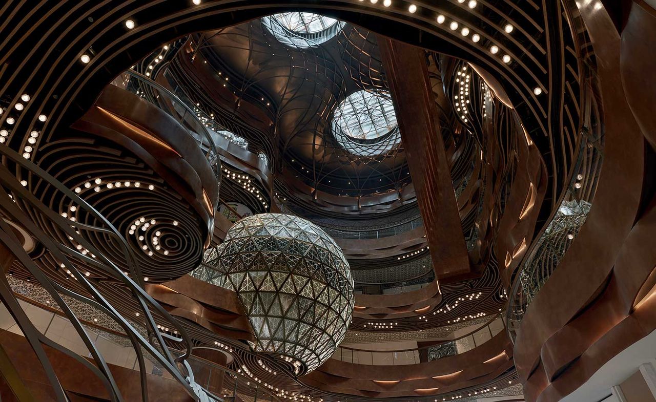 K11 Musea atrium with curved aluuminium panels and a spherical event space