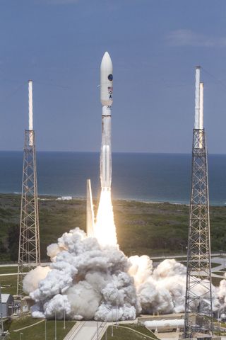 A United Launch Alliance Atlas 5 rocket launches the classified spy satellite NROL-67 into orbit for the National Reconnaissance Office on April 10, 2014 in a mission that lifted off from Space Launch Complex-41 at Cape Canaveral Air Force Station in Flor