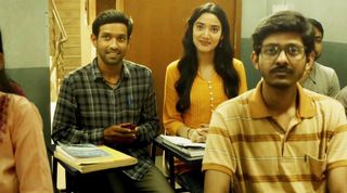 Vikrant Massey sitting at a desk in a classroom in 12th fail