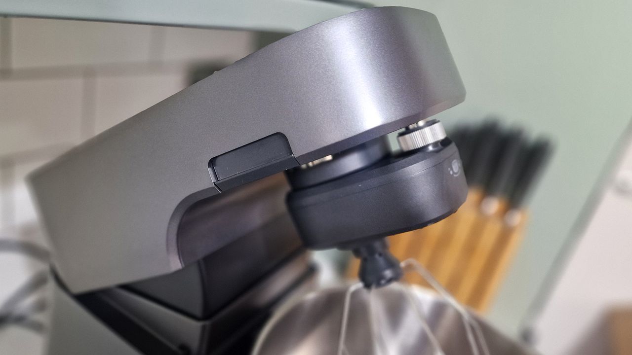 The Ooni Halo Pro Spiral mixer being tested in a green and white kitchen