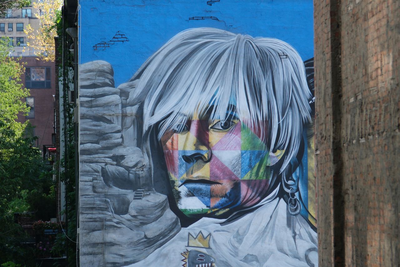 A mural of Andy Warhol on a building