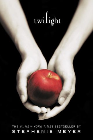 twilight book cover with two hands holding an apple