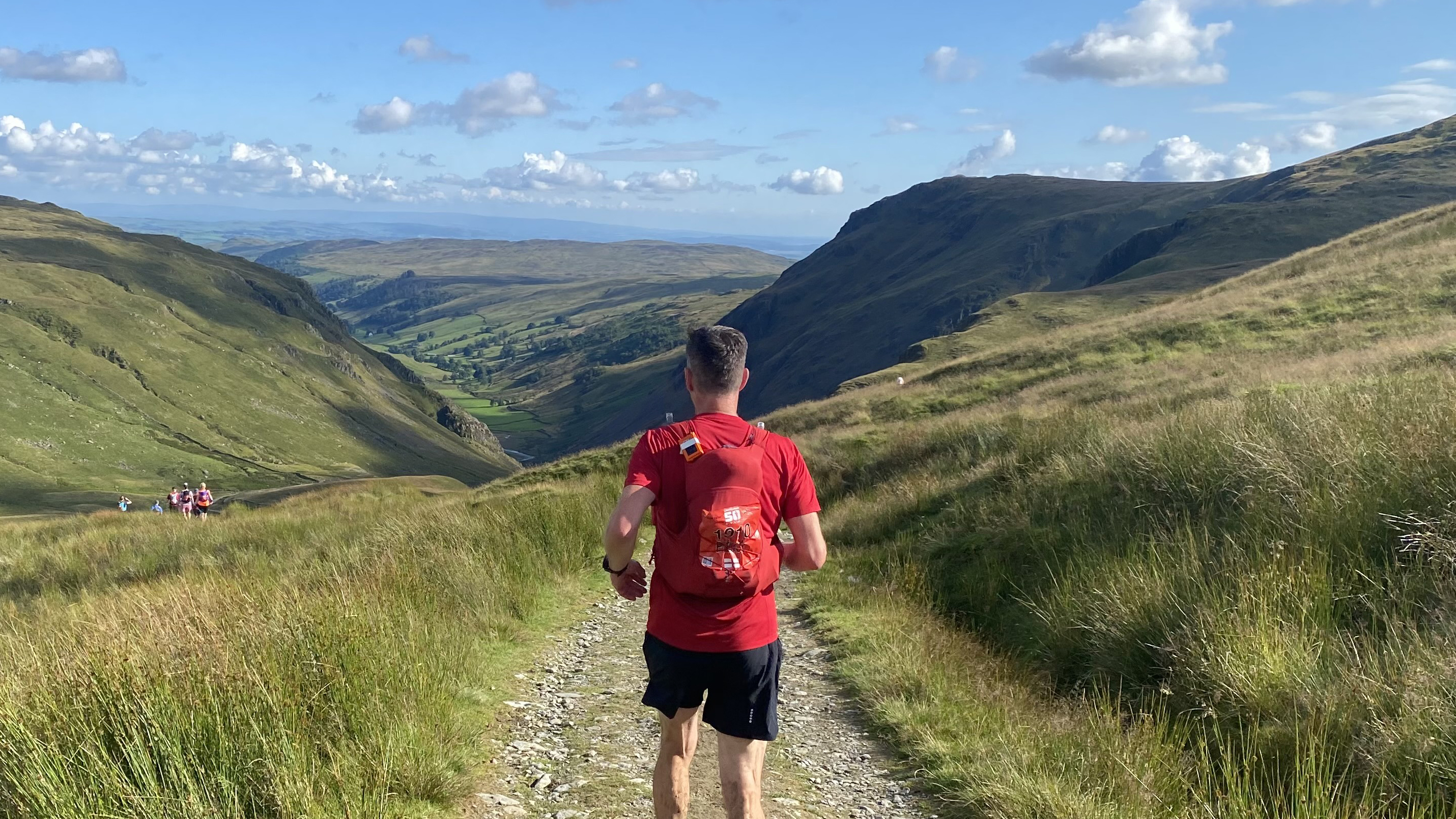 Runner wearing the Montane Gecko VP 12+ during a race