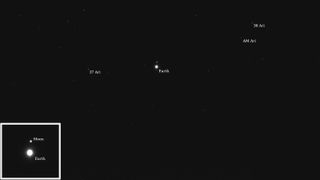 several white orbs on a black background