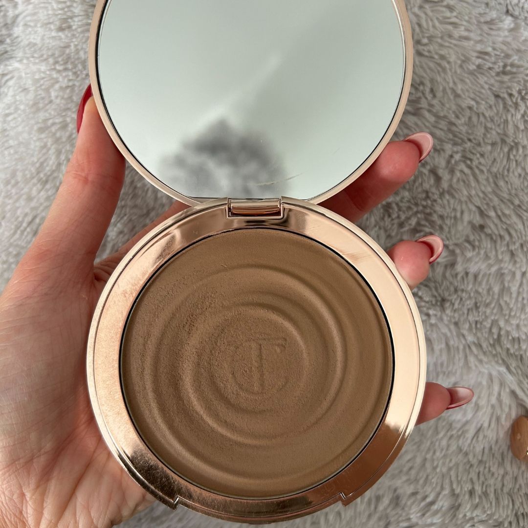 Charlotte Tilbury Beautiful Skin Bronzer open in hand