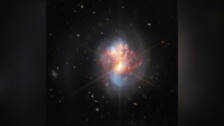 James Webb telescope observes two galaxies as they merge.