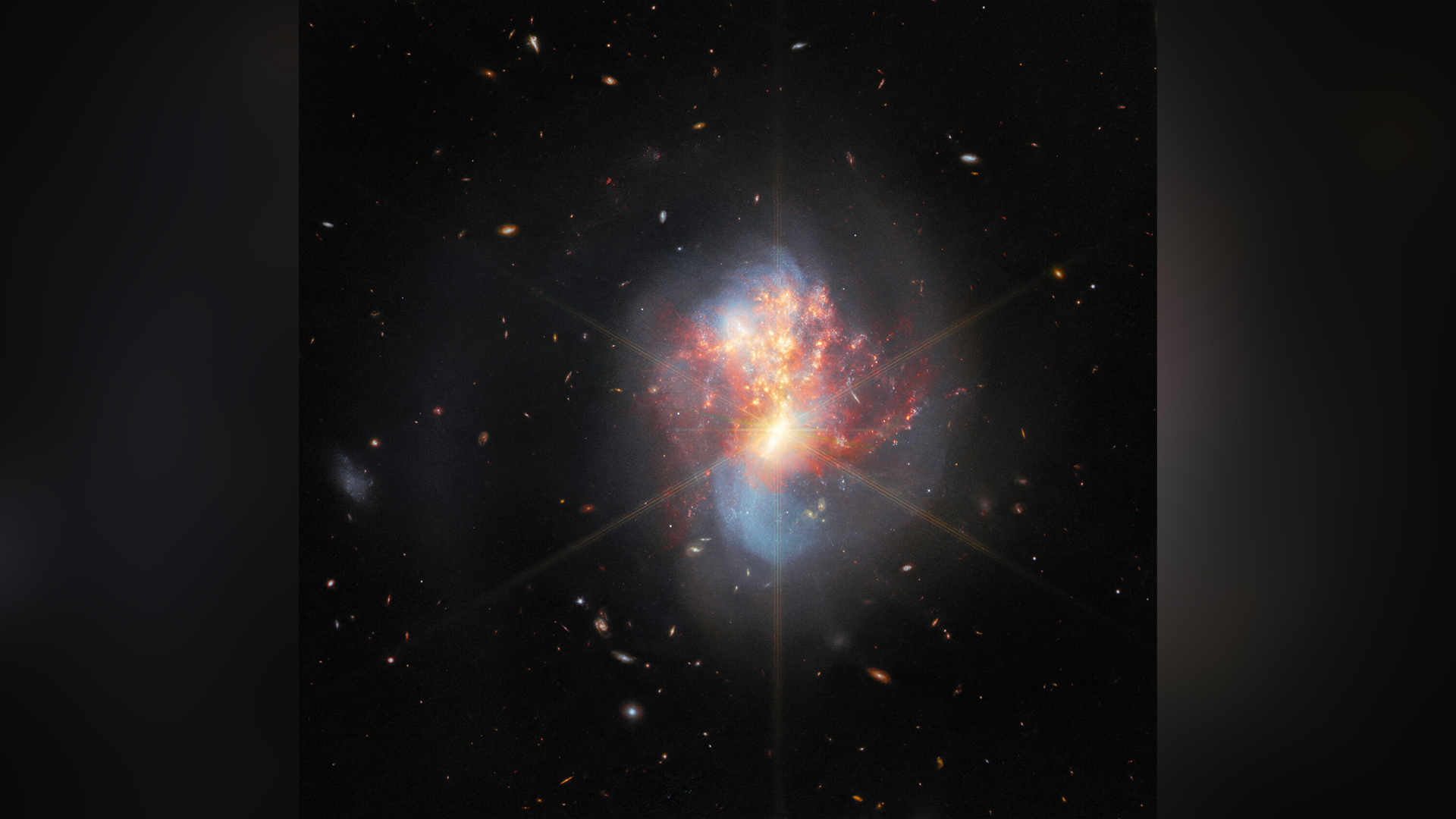 The James Webb Telescope observes two merging galaxies.