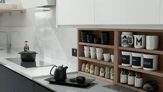 White contemporary kitchen with over counter shelf unit and open shelving to demonstrate how to organize a small kitchen in style