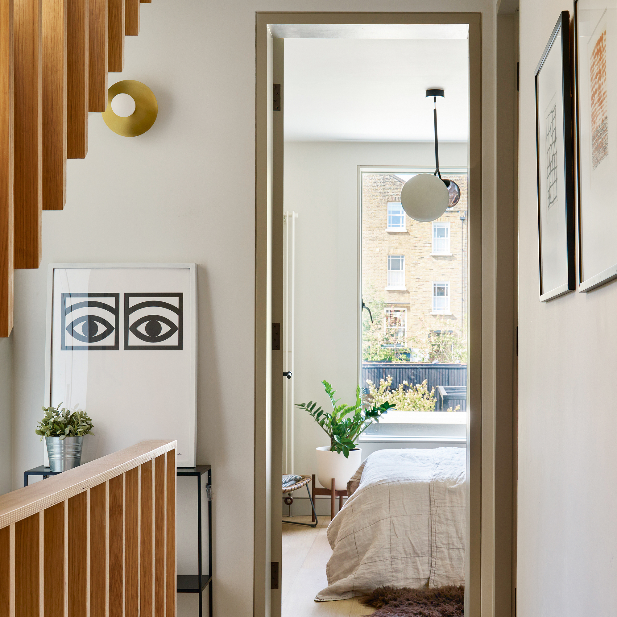 hallway and landing beside a set of stairs leading into a bedroom