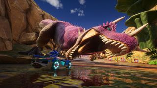 A T-Rex attempt to eat Sonic in Sonic Racing: CrossWorlds as he drives past it, from the Dinosaur Jungle track based on Sonic and the Secret Rings