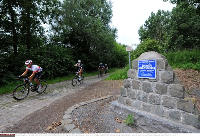 Omega Pharma QuickStep train over the cobbles that will be used during this year's Tour de France