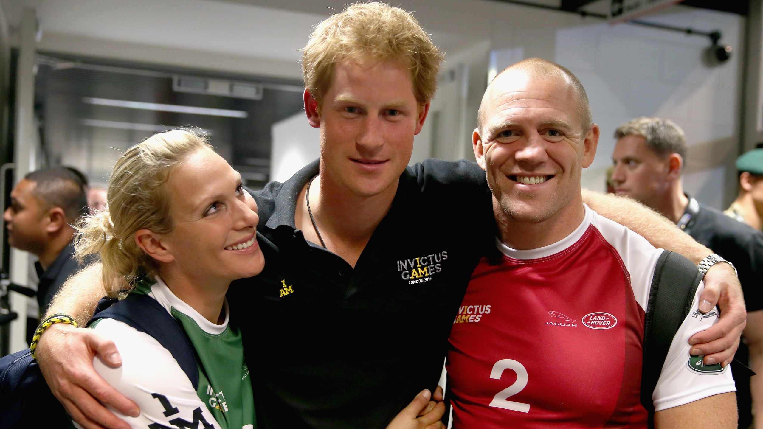 Prince Harry, Zara and Mike Tindall pose for a photograph after competing in an Exhibition wheelchair rugby match at the Copper Box on September 12, 2014