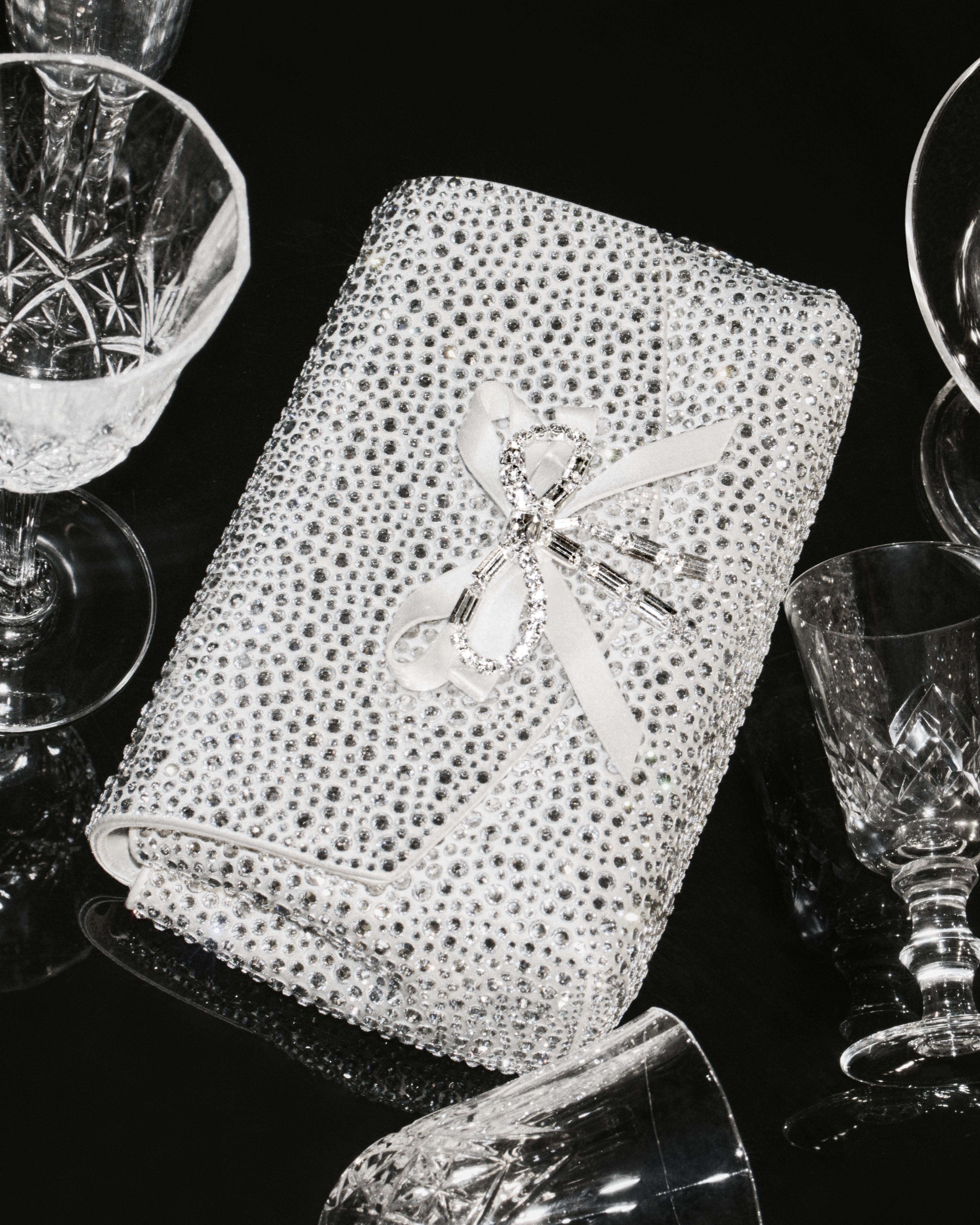 a silver diamante jimmy choo party bag