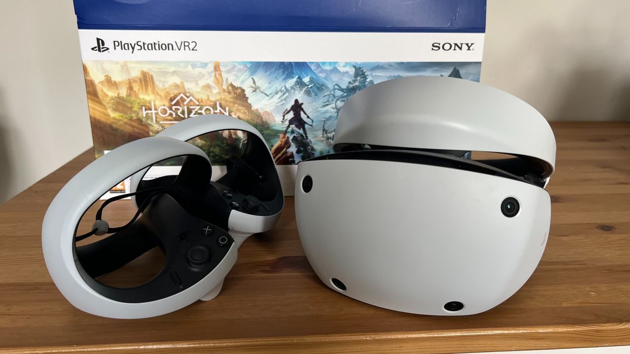 PSVR2- Close up of VR headset and controllers.