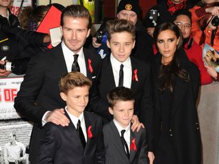 Victoria Beckham hits the red carpet with David and the boys