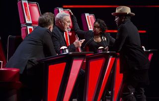 The Voice coaches chatting during filming