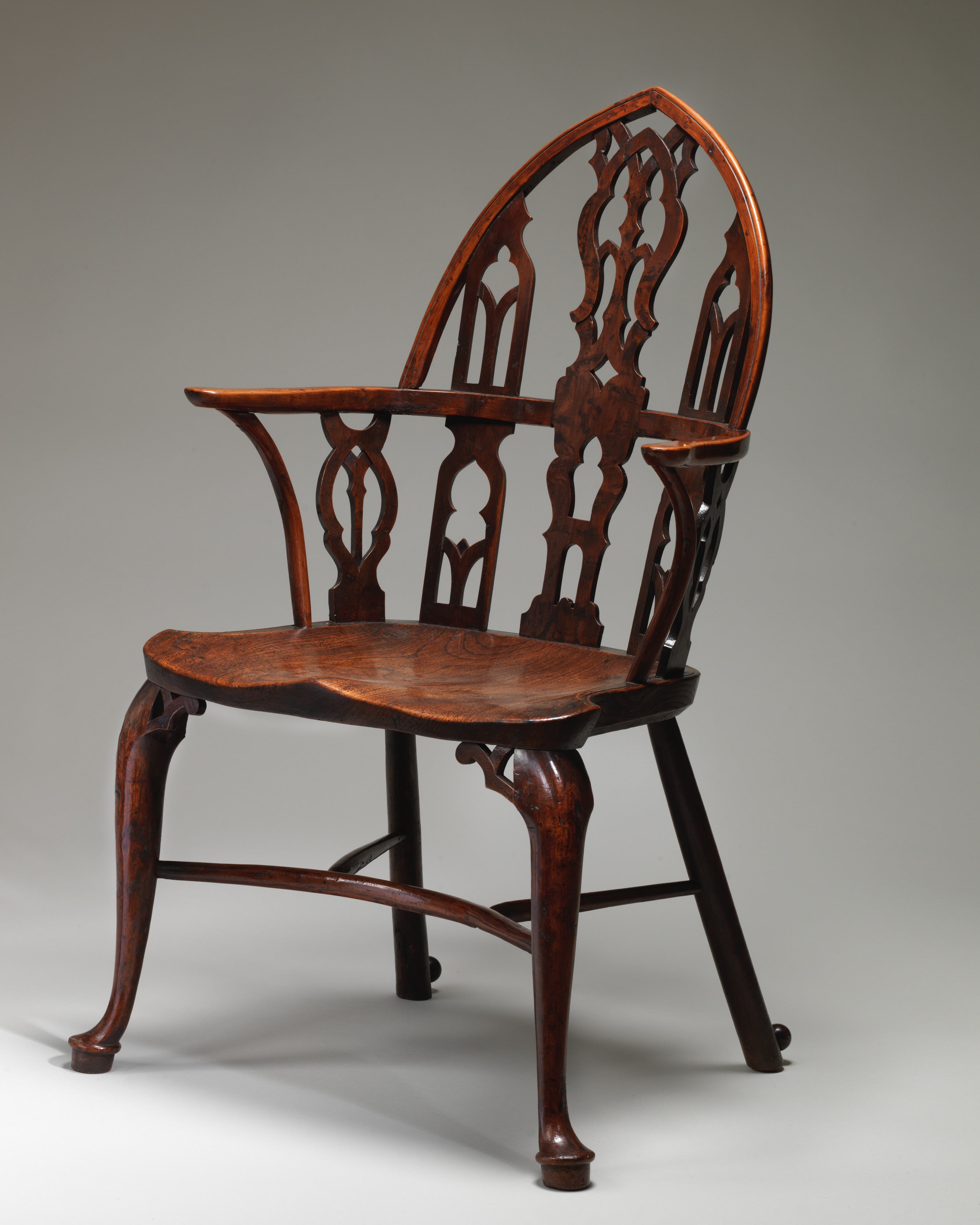 Wooden arch-back antique armchair