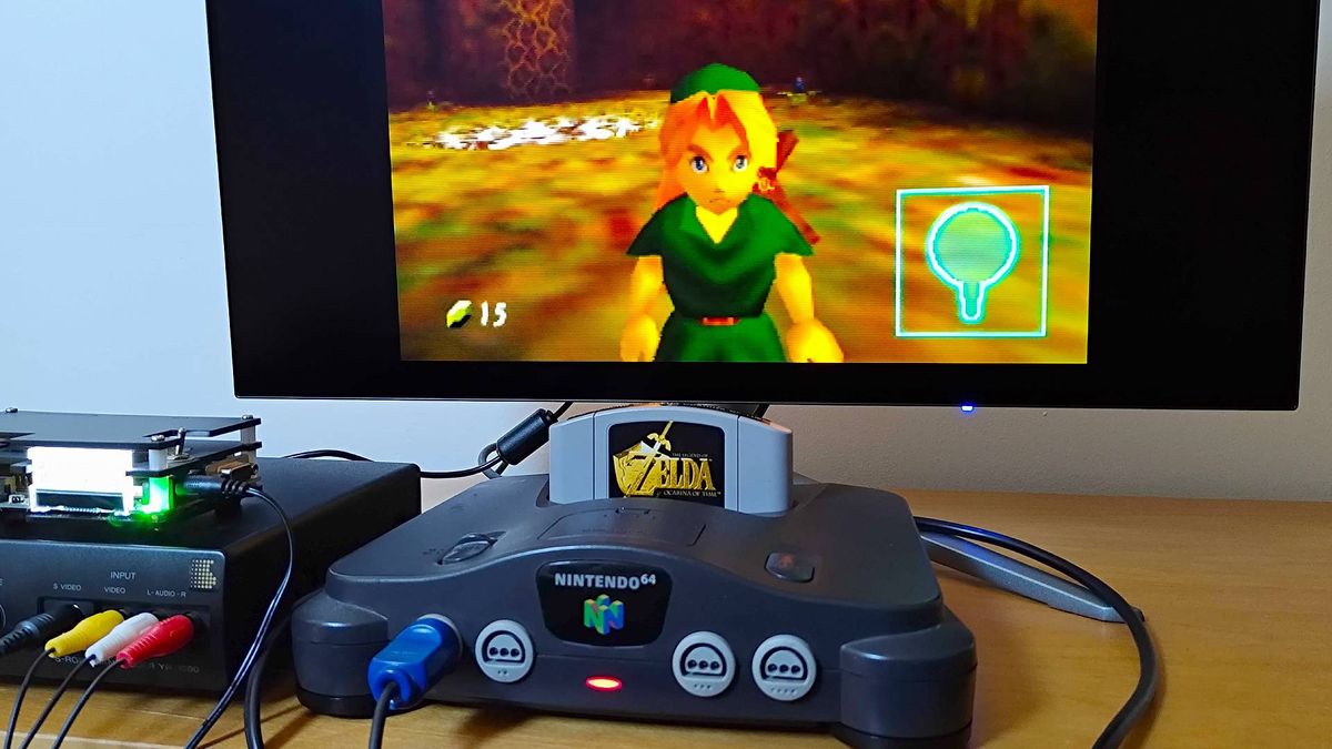 Nintendo 64 connected to monitor via OSSC and Sony transcoder with Zelda: Ocarina of Time gameplay on screen.