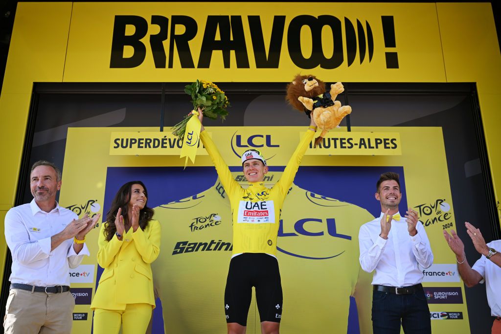 SUPERDEVOLUY LE DEVOLUY FRANCE JULY 17 Tadej Pogacar of Slovenia and UAE Team Emirates Yellow Leader Jersey celebrates at podium during the 111th Tour de France 2024 Stage 17 a 1778km stage from SaintPaulTroisChateaux to Superdevoluy 1500m UCIWT on July 17 2024 in Superdevoluy Le Devoluy France Photo by Dario BelingheriGetty Images