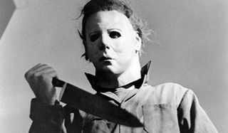 Halloween (1978) Michael Myers stands with his trusty knife