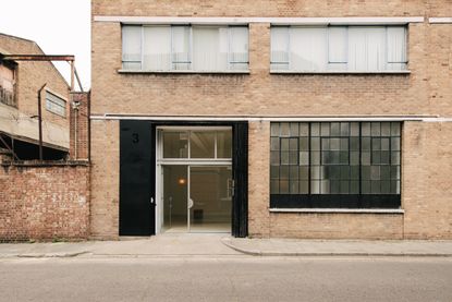 All Projects, a new minimalist new gallery by EBBA, in an old east london warehouse - brick outside and clean, textured surfaces inside