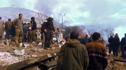 The aftermath of a car bomb in Azaz, Syria