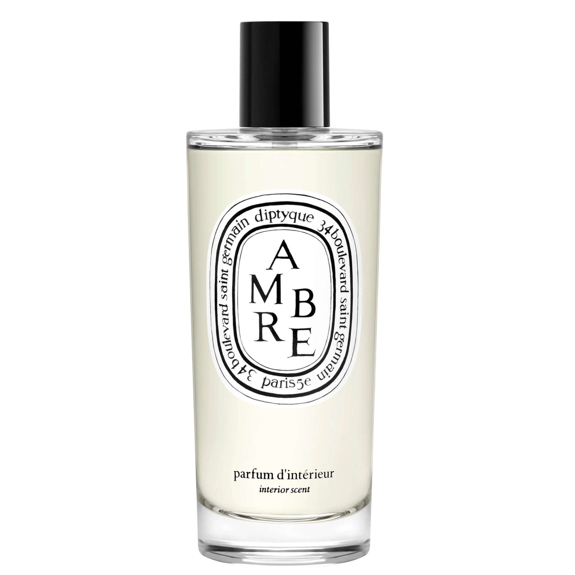 A glass bottle of Diptyque Ambre room spray with a white logo and black lid