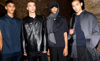 Males modelling dark clothing from Qasimi's S/S 2020 collection