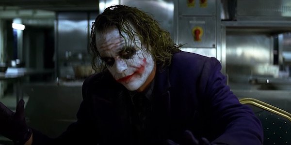 The Dark Knight's Infamous Pencil Trick Explained | Cinemablend