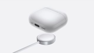 The AirPods 4 with ANC's charging case above a wireless charging