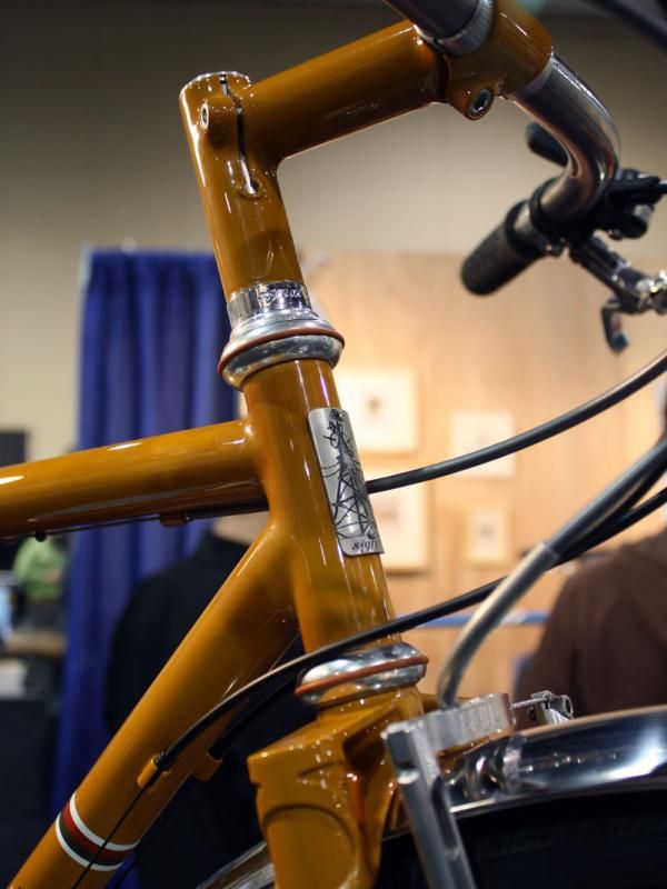 A custom Signal Cycles stem tops a carved headset spacer and a rare, WTB/Chris King headset.