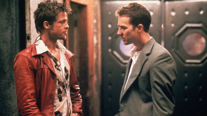 A still from Fight Club with actors Brad Pitt and Edward Norton staring at each other 
