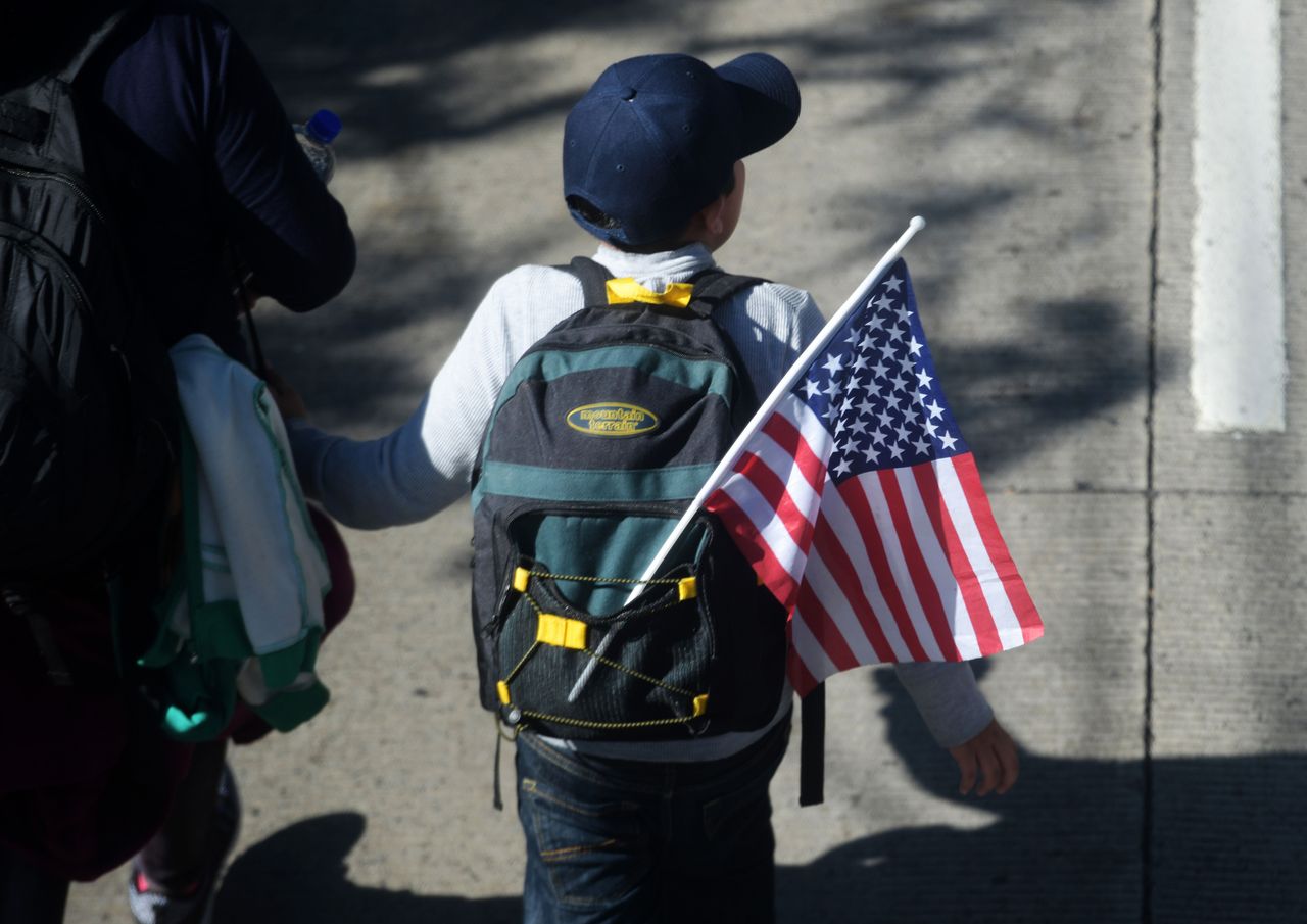 A child in a migrant caravan traveling to the U.S.