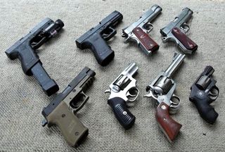 An assortment of handguns.