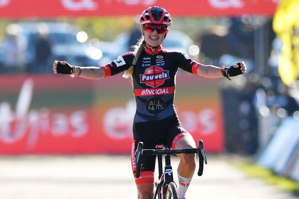 ZONHOVEN BELGIUM OCTOBER 24 Denise Betsema of The Netherlands and Team Pauwels Sauzen Bingoal celebrates at finish line as race winner during the 25th Zonhoven UCI CycloCross Worldcup 2021 Womens Elite CXWorldCup UCIcyclocrossWC zonhoven on October 24 2021 in Zonhoven Belgium Photo by Luc ClaessenGetty Images