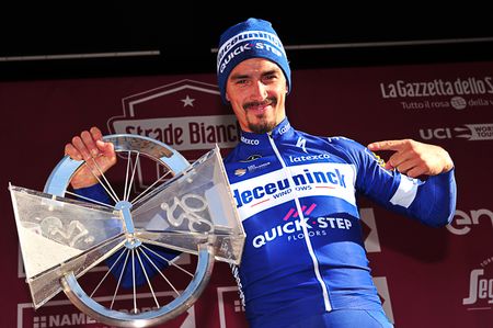 Julian Alaphilippe with the 2019 Strade Bianche trophy