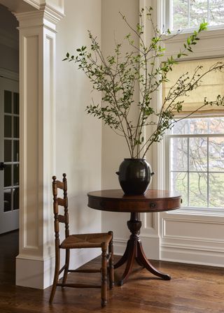 An off white wall paint in a southern facing room filled with natural light