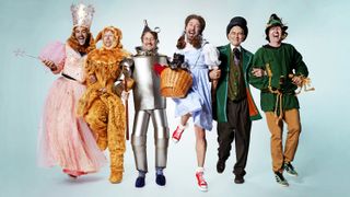 foo fighters pose as the characters from the wizard of oz in a portrait from when they hosted saturday night live