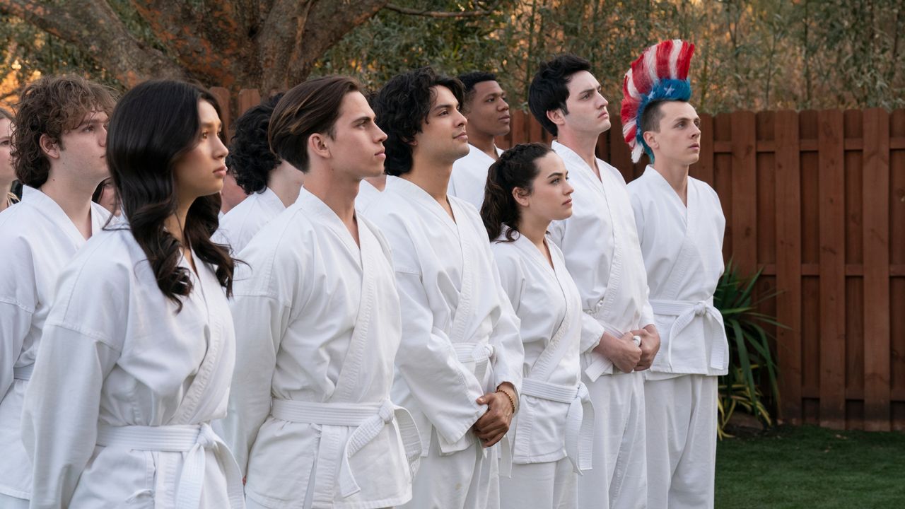 Oona O’Brien as Devon, Tanner Buchanan as Robby Keene, Xolo Maridueña as Miguel Diaz, Khalil Everage as Chris, Mary Mouser as Samantha LaRusso, Gianni DeCenzo as Demetri, Jacob Bertrand as Eli &#039;Hawk&#039; Moskowitz in Cobra Kai.