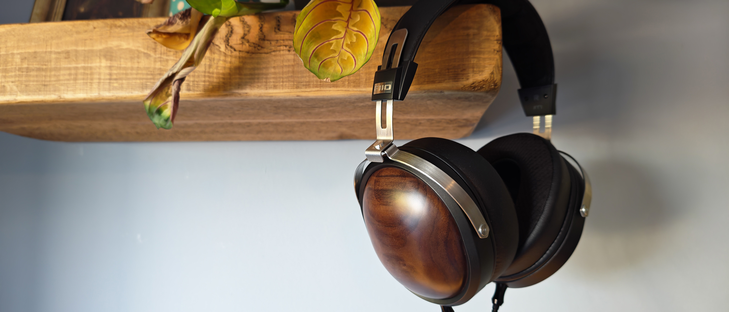 Various photos of the FiiO FT1 headphones, in a home office. 