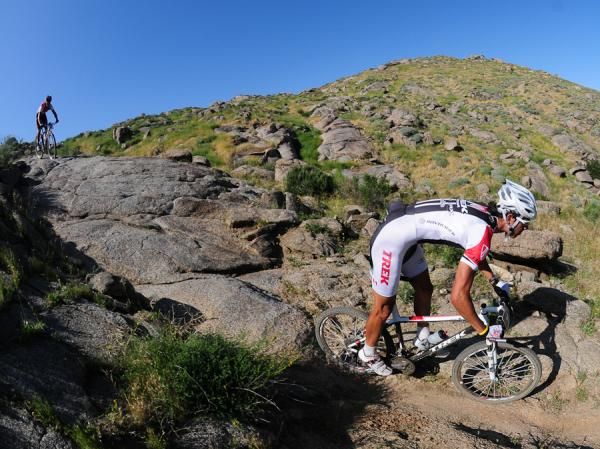 Adam Morka (Trek Toronto) descending a rock face.