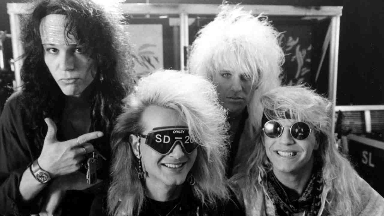 Poison posing for a photograph in 1988