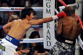 ESPN and Top Rank Inc. has signed a multi-year distribution deal that will feature such fighters as Manny Pacquiao (left).