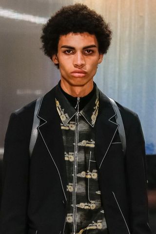 Male model walks with afro in the Prada show, Spring Summer 2016