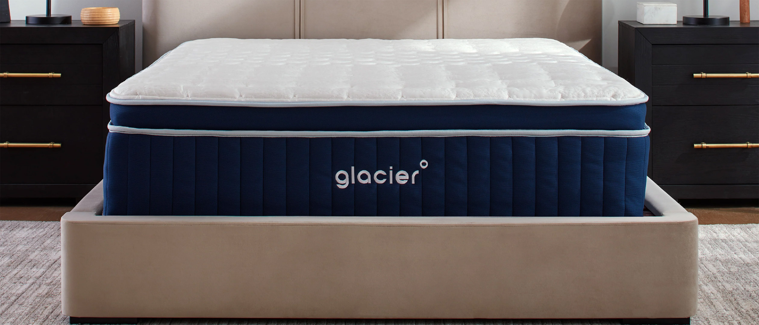 The Glacier Apex Hybrid mattress on a bed in a bedroom