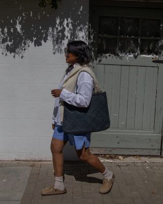 Influencer wears blue striped shorts trend